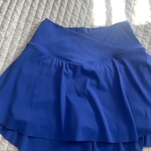 HALARA vibrant blue tennis skirt